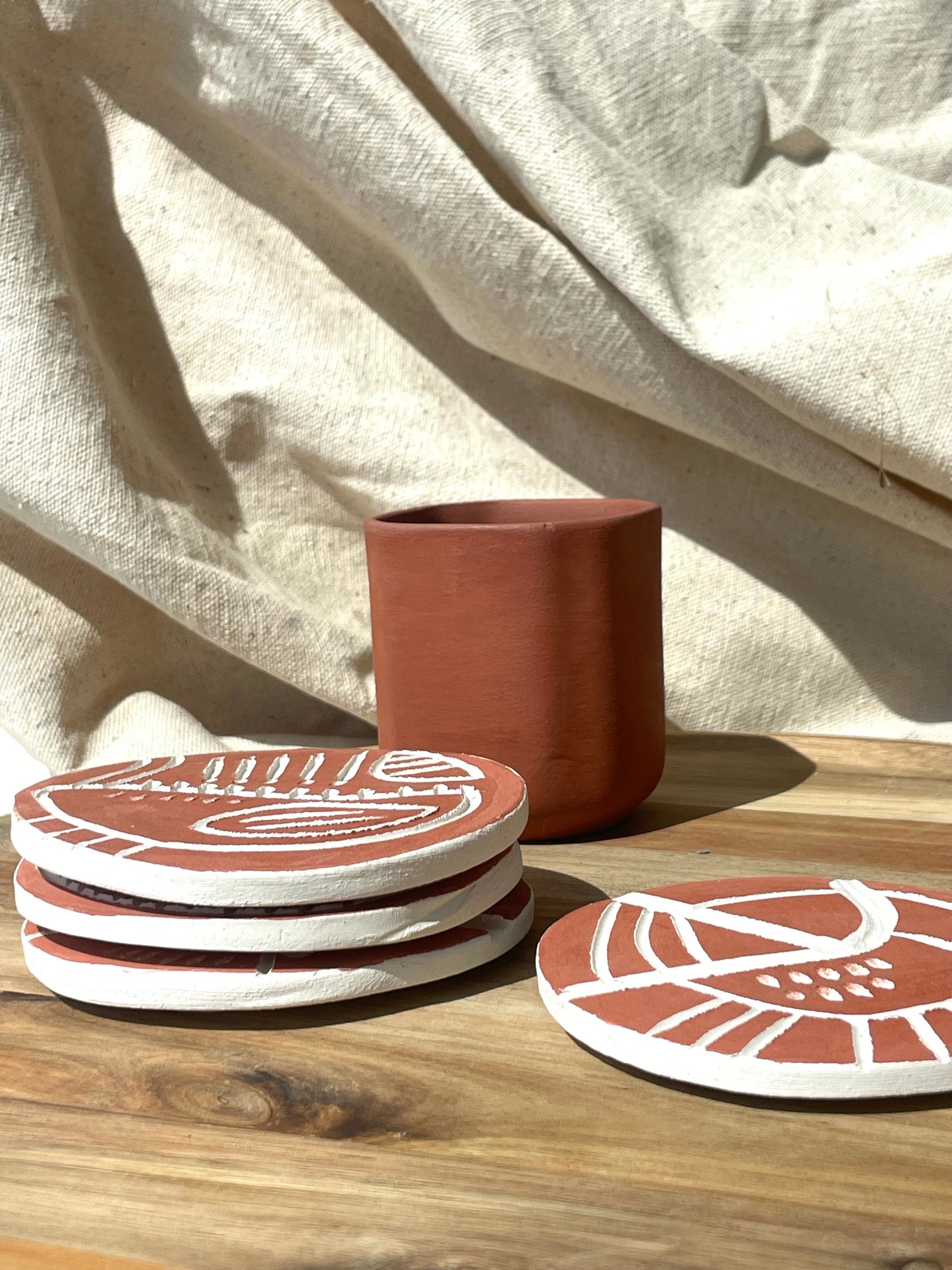 Matte Terracotta Set of 4 Hand made kiambu ceramic Coasters : Signed by Ruth ( only one set left